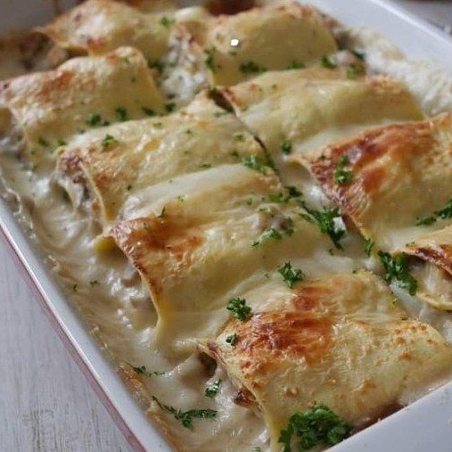Involtini di lasagne con prosciutto e funghi