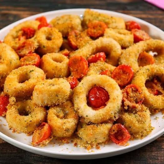 Fette di calamaro gratinato